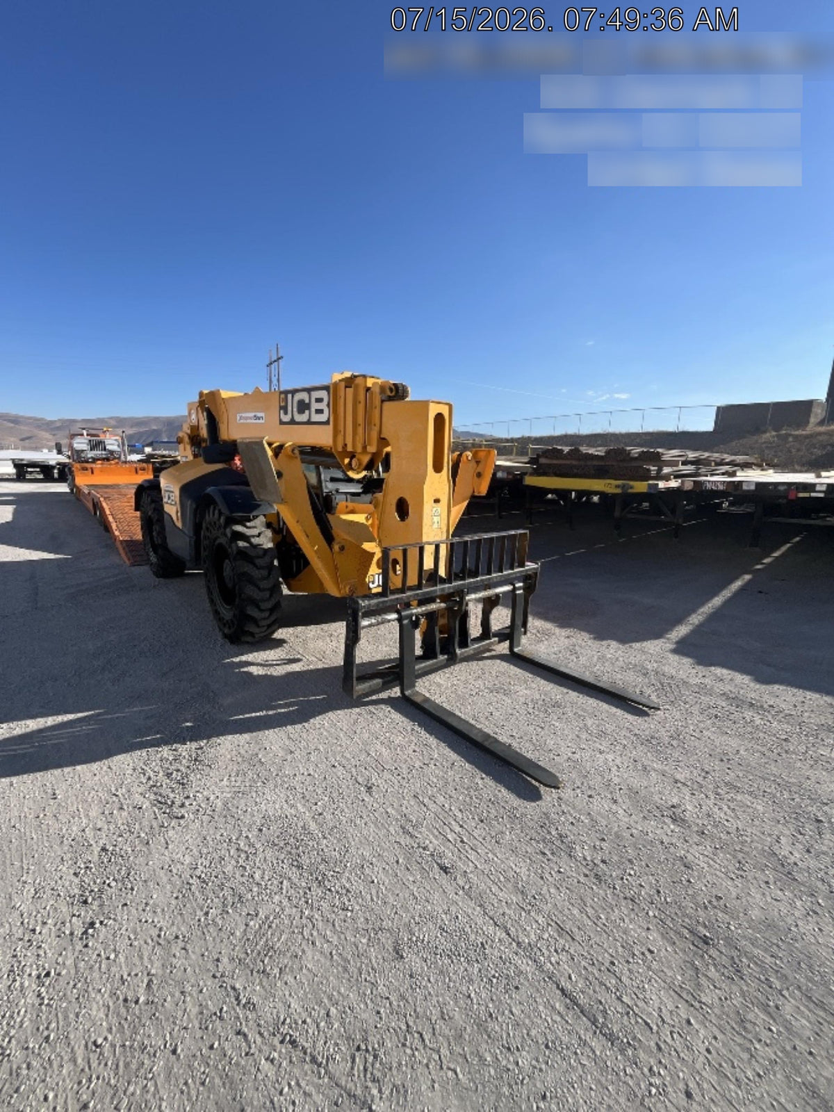 2019 JCB 510-56 74 HP w/Open ROPS, Beacon, Aux Hydraulics, Worklights, Solid Tires w/60" Carriage/Forks