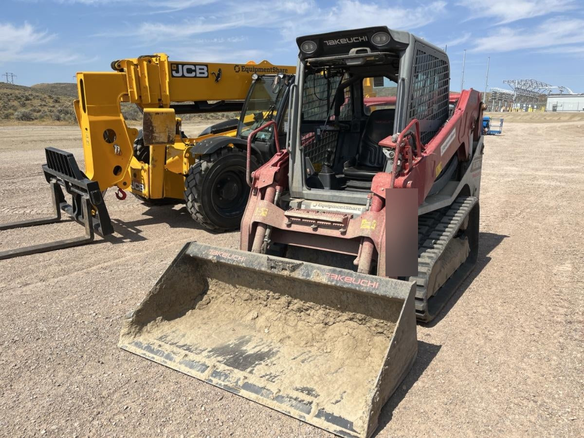 2019 Takeuchi TL10V2-CR Cab/Heat/AC, Rubber Tracks, Backup Alarm, Front & rear working Lights, Auxiliary Hydraulics, 2 Speed Travel, Engine Monitoring System, Hydraulic universal quick hitch w/76" HD dirt bucket with 8 teeth, 20.3 cubic feet capacity, 48" Pallet forks and frame