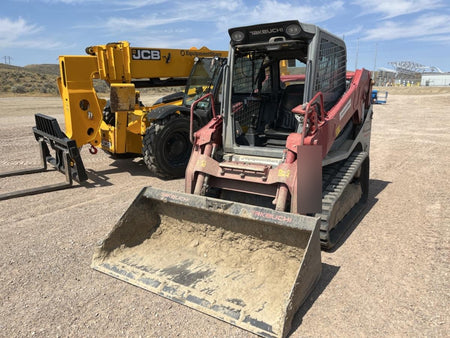 2019 Takeuchi TL10V2-CR Cab/Heat/AC, Rubber Tracks, Backup Alarm, Front & rear working Lights, Auxiliary Hydraulics, 2 Speed Travel, Engine Monitoring System, Hydraulic universal quick hitch w/76" HD dirt bucket with 8 teeth, 20.3 cubic feet capacity, 48" Pallet forks and frame
