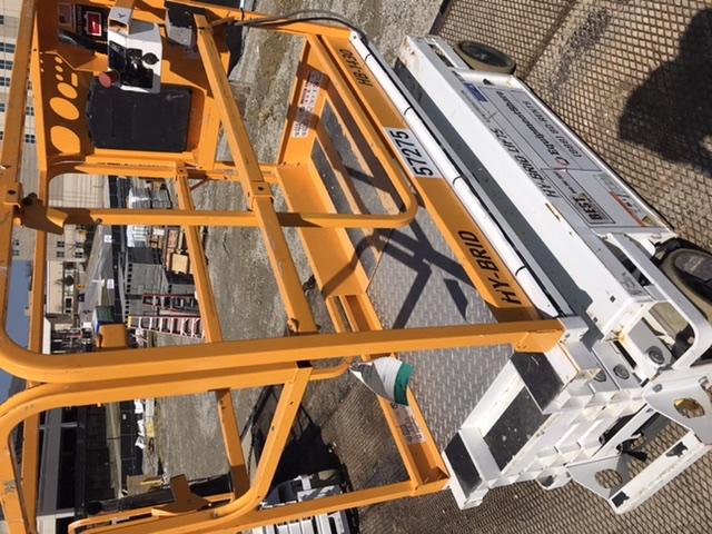 Custom Equipment HB-1430 <ul>
 <li>Hy-Brid Scissor Lift</li>
  <li>Platform capacity up to 670 lbs.</li>
  <li>Working height up to 20 ft</li>
  <li>Weighs under 1,700 lbs.</li>
  <li>Non-marking wheels </li>
</ul>