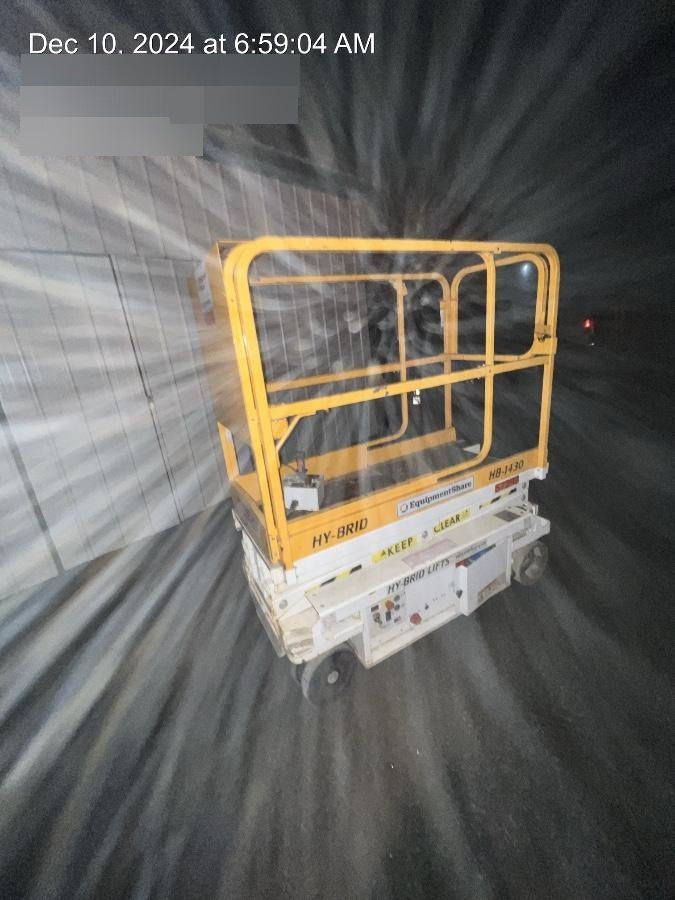 Custom Equipment HB-1430 <ul>
 <li>Hy-Brid Scissor Lift</li>
  <li>Platform capacity up to 670 lbs.</li>
  <li>Working height up to 20 ft</li>
  <li>Weighs under 1,700 lbs.</li>
  <li>Non-marking wheels </li>
</ul>