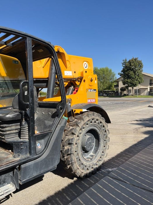 2019 JCB 510-56 74 HP w/Open ROPS, Beacon, Aux Hydraulics, Worklights, Solid Tires w/60" Carriage/Forks