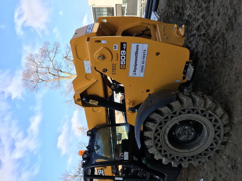 2019 JCB 509-42 74 HP w/Open ROPS, Beacon, Aux Hydraulics, LED Work lights, Solid Tires 66" Carriage/60" Forks
