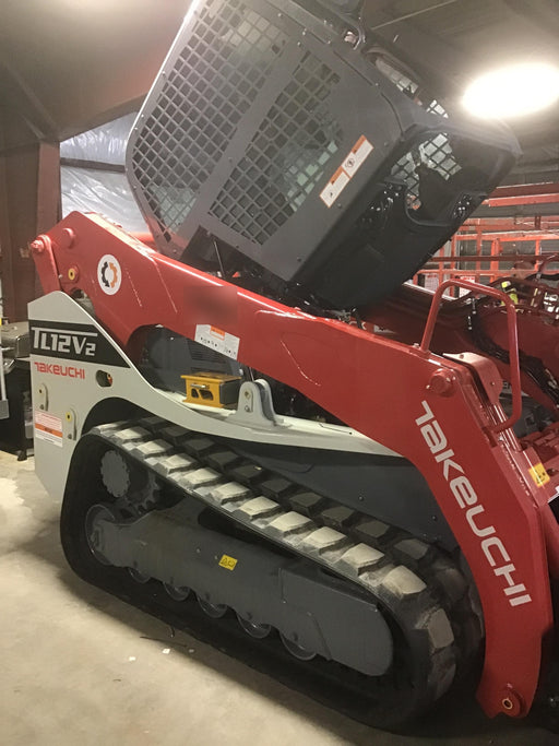 2019 Takeuchi TL12V2C ROPS/FOPS Cab, Heat/AC, Defroster, Rubber Tracks, Back-up Alarm, Front & Rear Working Lights, Auxiliary Hydraulics, Two-Speed Travel, Electronic Monitoring System, Hydraulic Universal Quick Hitch w/80" HD Dirt Bucket with 9 Teeth 24.0 cu.ft. Capacity