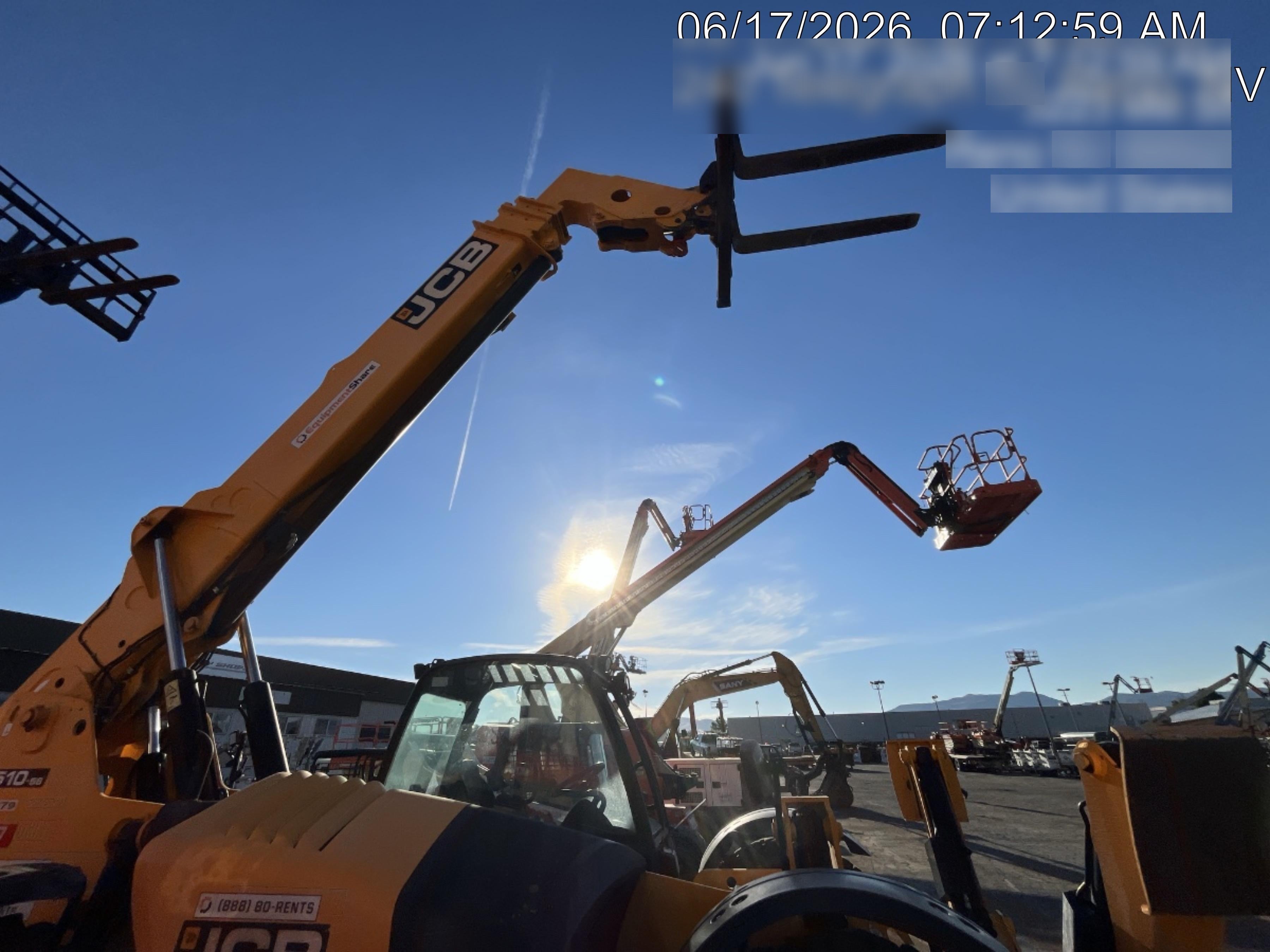 2019 JCB 510-56 74 HP w/Open ROPS, Beacon, Aux Hydraulics, Worklights, Solid Tires w/60" Carriage/Forks