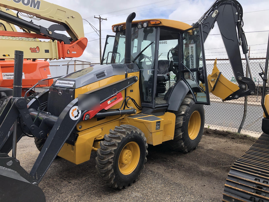 2019 John Deere 410L 4WD, CAB/HVAC, Standard Dipperstick, ISO Controls, Rear Aux Hydraulics, Manual QC w/1.5 Yd Bucket w/Forks, 24" Bucket
