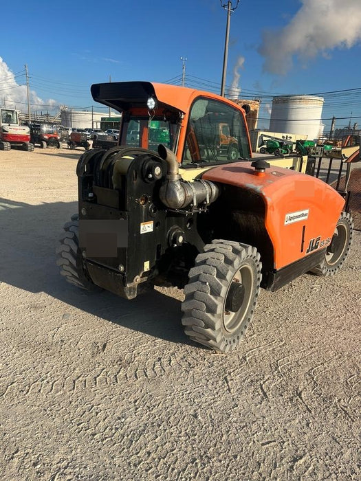 2020 JLG G5-18A Cab/Heat/Air, NM Solid Tires, Beacon w/48" Carriage, 48" Pallet Forks