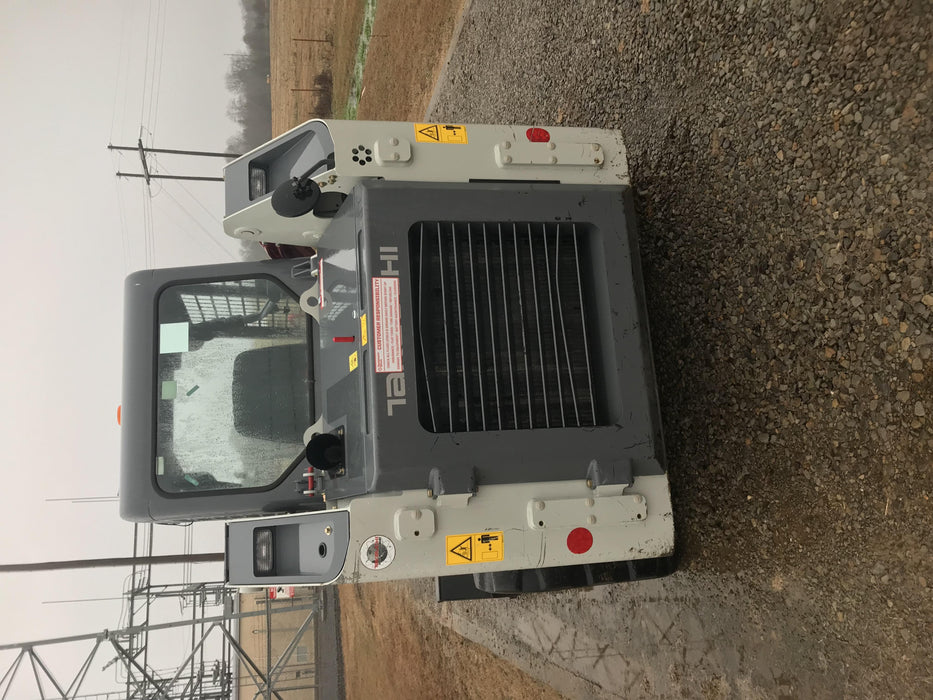 2019 Takeuchi TL8 Radial ROPS, ROPS/FOPS Canopy, 15" Wide Rubber Tracks, Back-up Alarm, Front & Rear Working Lights, Auxiliary Hydraulics, Two-Speed Travel, Electronic Monitoring System 76" HD Dirt Bucket with 8 Teeth, 20.3 cubic feet Capacity