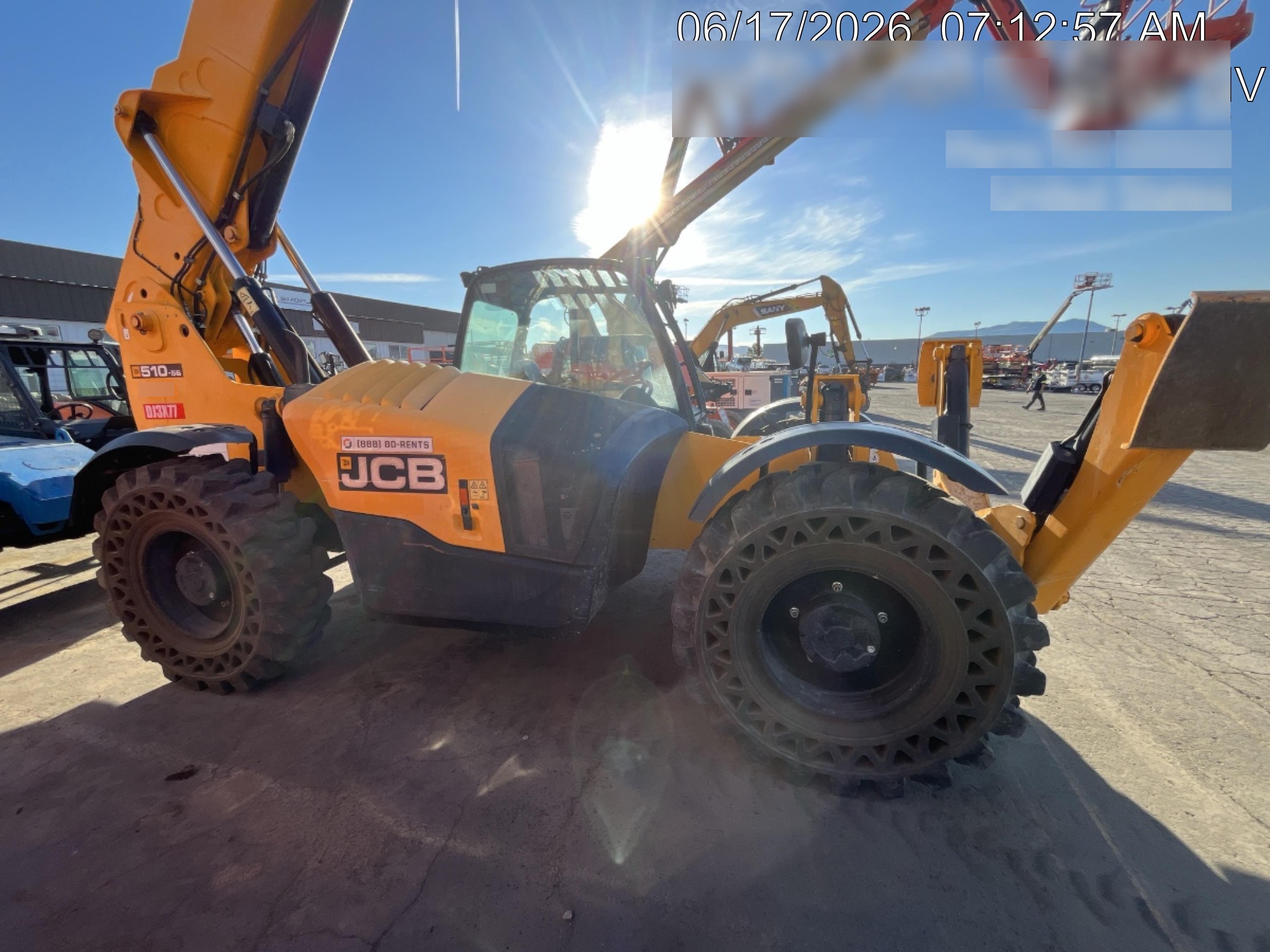 2019 JCB 510-56 74 HP w/Open ROPS, Beacon, Aux Hydraulics, Worklights, Solid Tires w/60" Carriage/Forks