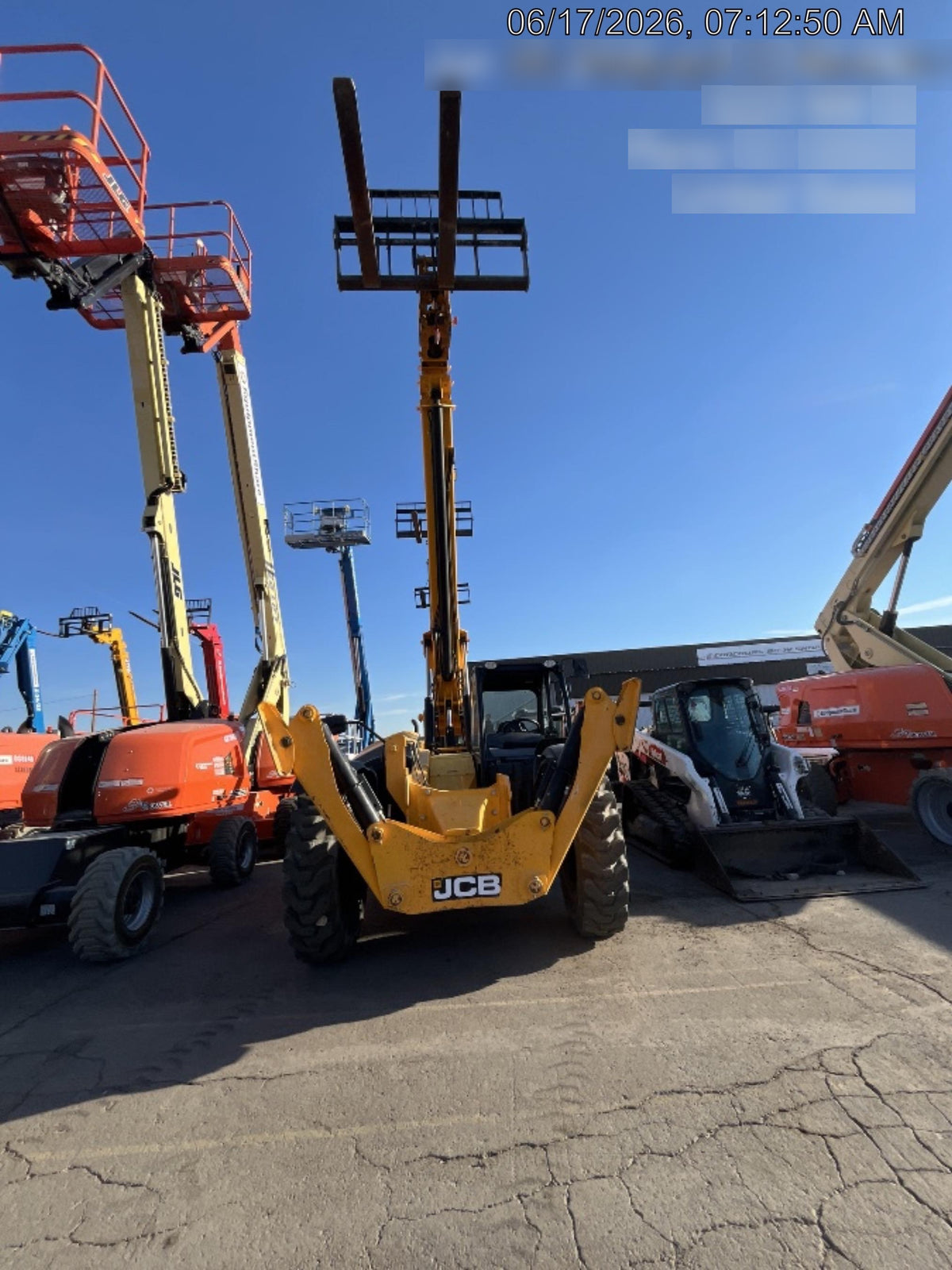 2019 JCB 510-56 74 HP w/Open ROPS, Beacon, Aux Hydraulics, Worklights, Solid Tires w/60" Carriage/Forks