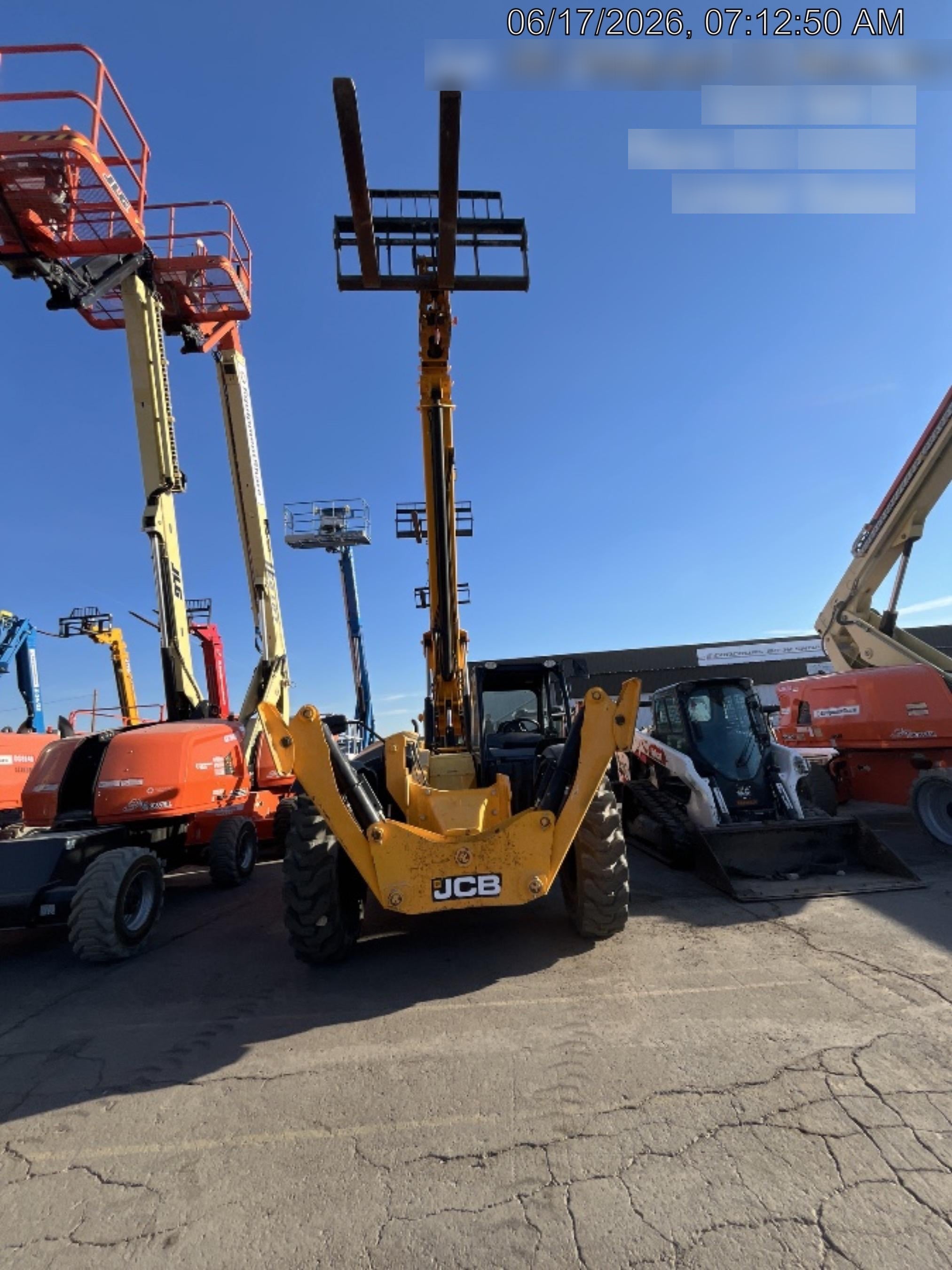 2019 JCB 510-56 74 HP w/Open ROPS, Beacon, Aux Hydraulics, Worklights, Solid Tires w/60" Carriage/Forks