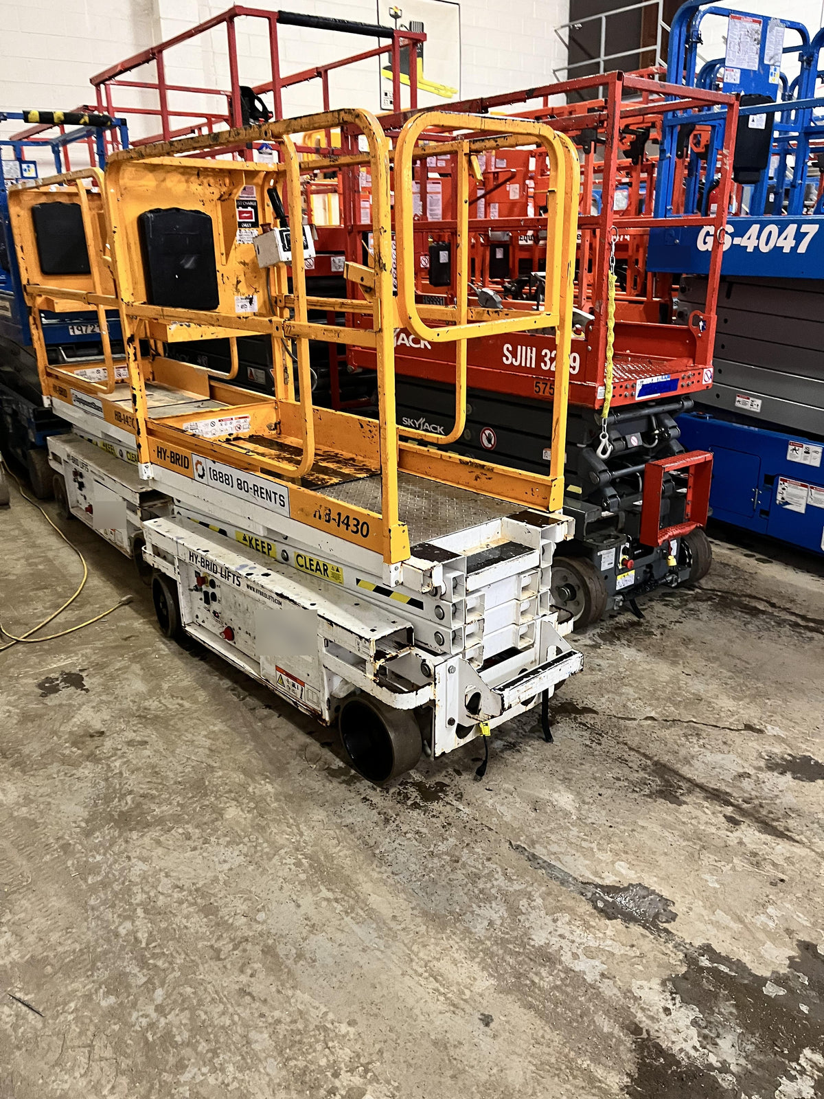 Custom Equipment HB-1430 Hy-Brid Scissor Lift
Platform capacity up to 670 lbs
Working height up to 20 ft
Weighs under 1,700 lbs
Non-marking wheels