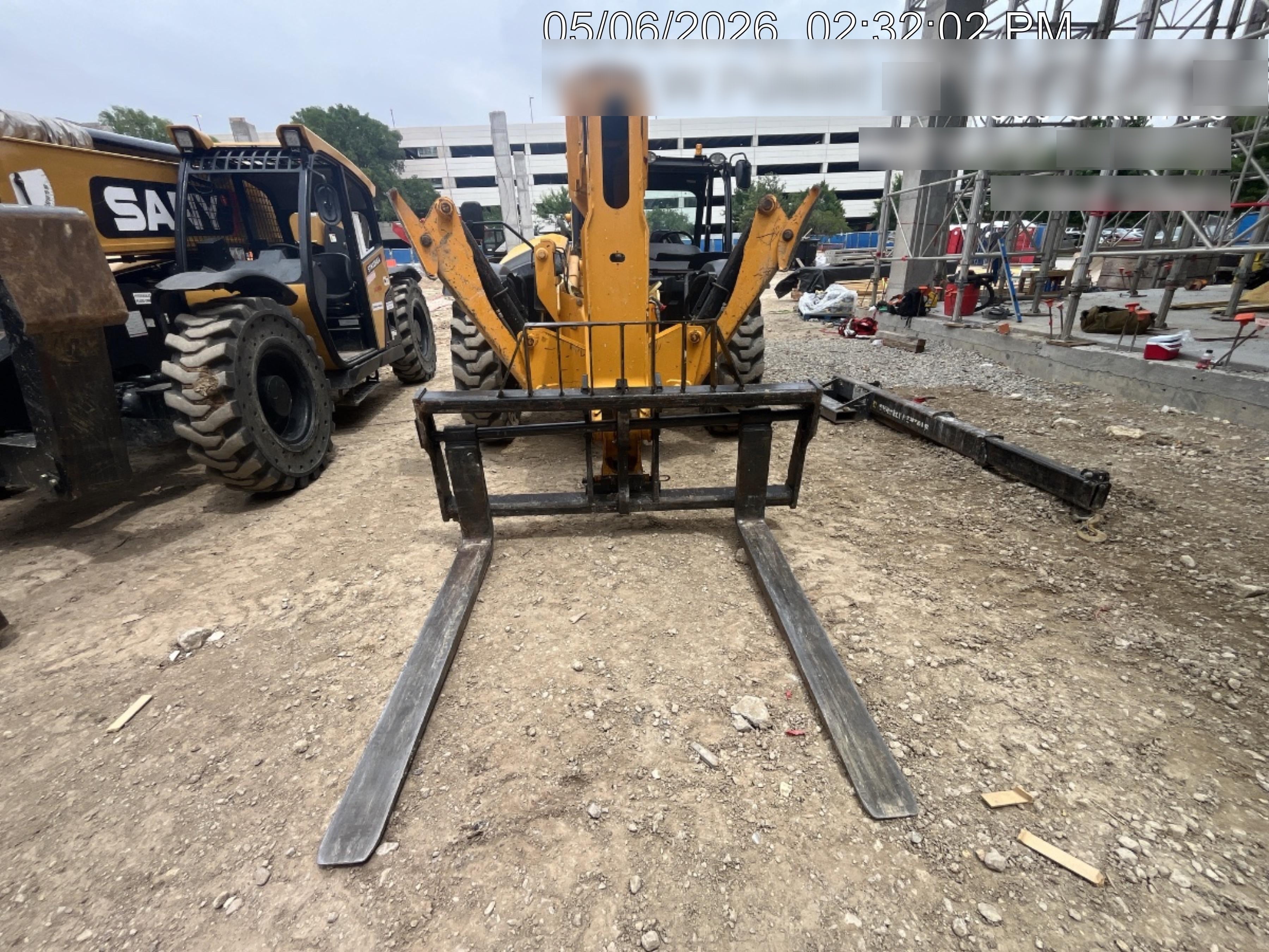 2019 JCB 512-56 74 HP w/Open ROPS, Beacon, Aux Hydraulics, Worklights, Solid Tires w/60" Carriage/Forks