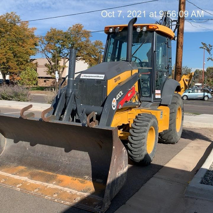 2019 John Deere 410L 4WD, CAB/HVAC, Standard Dipperstick, ISO Controls, Rear Aux Hydraulics, Manual QC, 1.5 Yd Bucket w/Forks, 24" Bucket