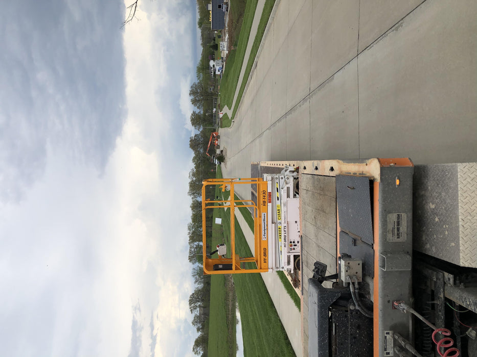 Custom Equipment HB-1430 <ul>
 <li>Hy-Brid Scissor Lift</li>
  <li>Platform capacity up to 670 lbs.</li>
  <li>Working height up to 20 ft</li>
  <li>Weighs under 1,700 lbs.</li>
  <li>Non-marking wheels </li>
</ul>