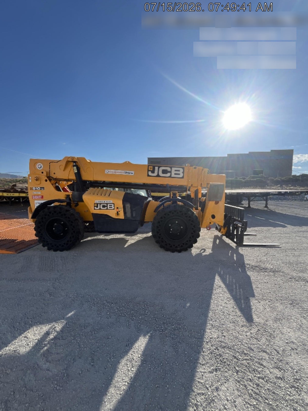 2019 JCB 510-56 74 HP w/Open ROPS, Beacon, Aux Hydraulics, Worklights, Solid Tires w/60" Carriage/Forks