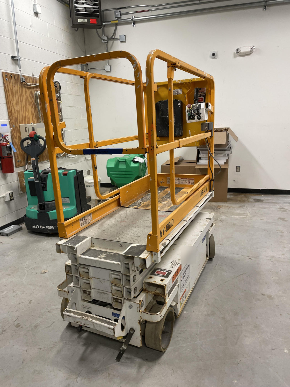 Custom Equipment HB-1430 Hy-Brid Scissor Lift
Platform capacity up to 670 lbs
Working height up to 20 ft
Weighs under 1,700 lbs
Non-marking wheels