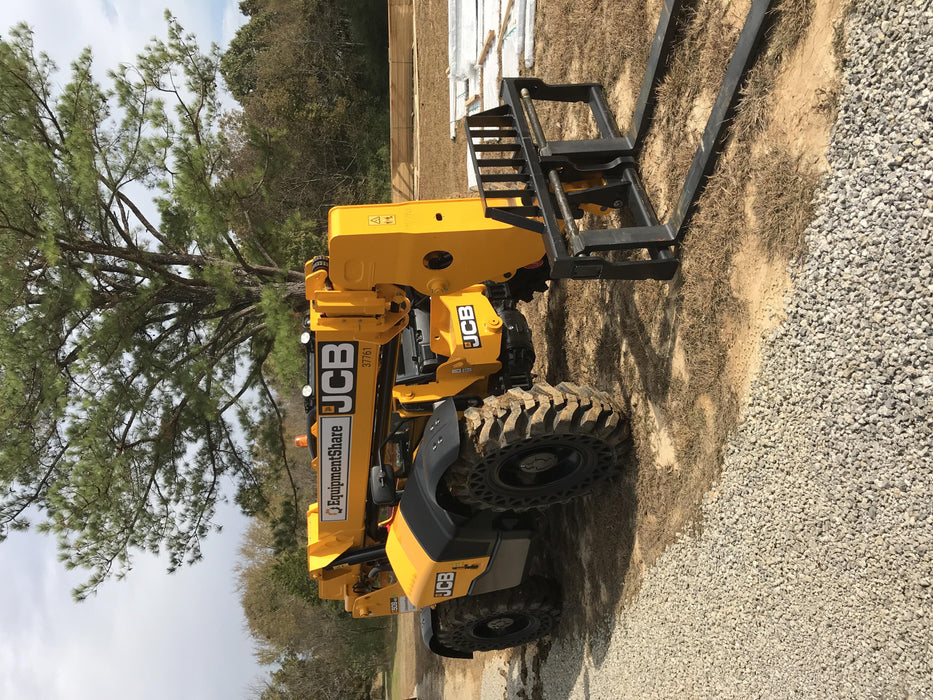 2019 JCB 509-42 Open ROPS, 74 HP, Solid Tires, Worklights, Beacon, Aux Hydraulics, Lifting Eye 66" Carriage/60" Forks