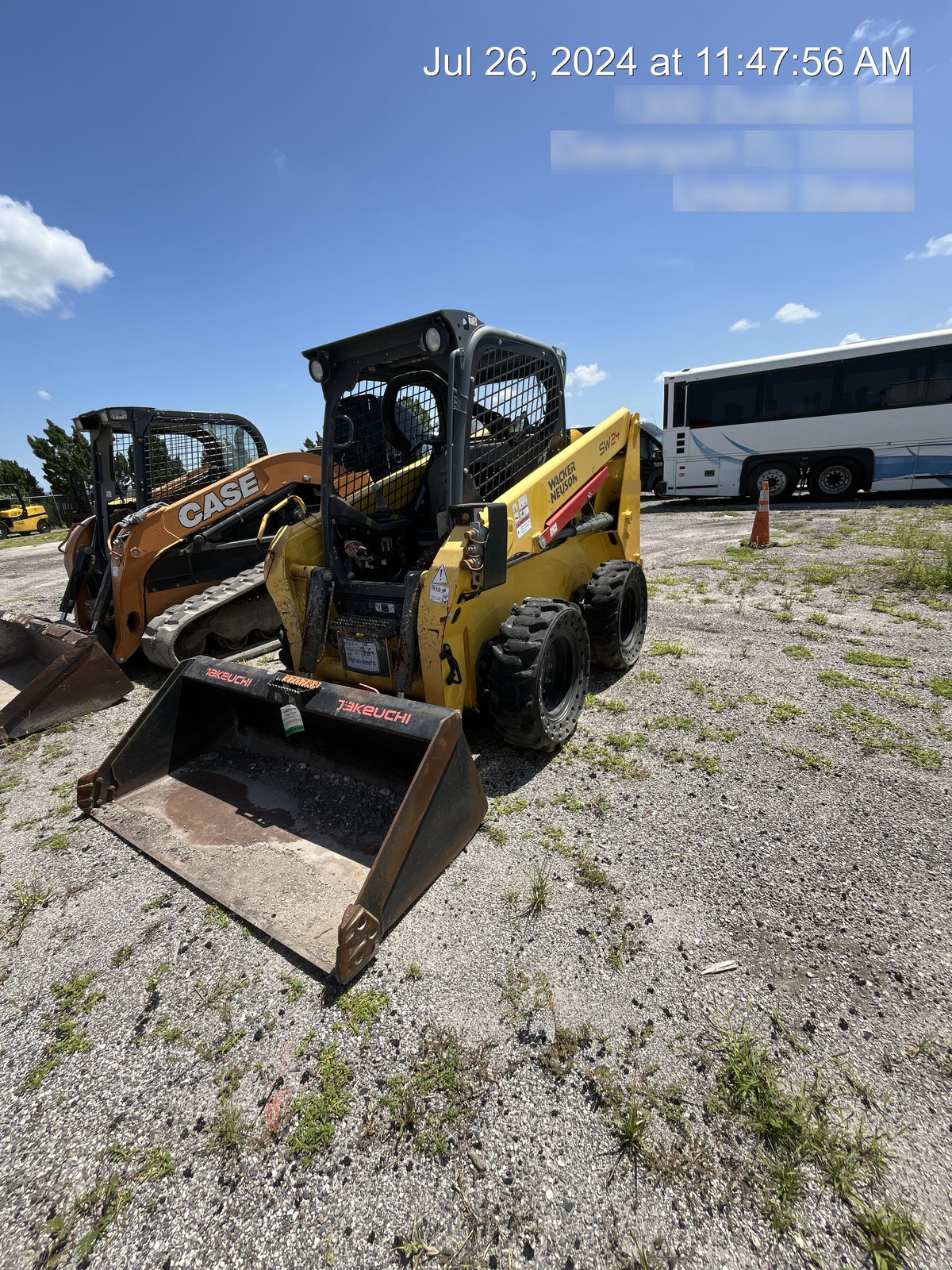 Wacker Neuson SW24 SW24 8k Wheeled Skid Loader, open ROPS, 75" Bucket LP w/ smooth bolt on edge, 72” Angle broom w/universal controller 8 pin