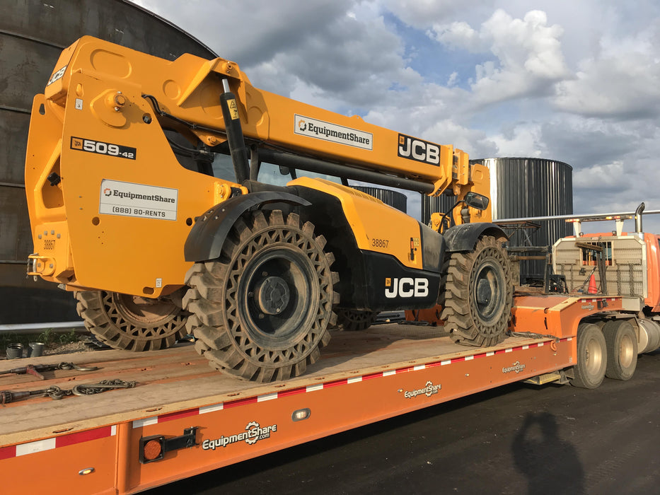 2019 JCB 509-42 74 HP w/Open ROPS, Beacon, Aux Hydraulics, LED Work lights, Solid Tires 66" Carriage/60" Forks