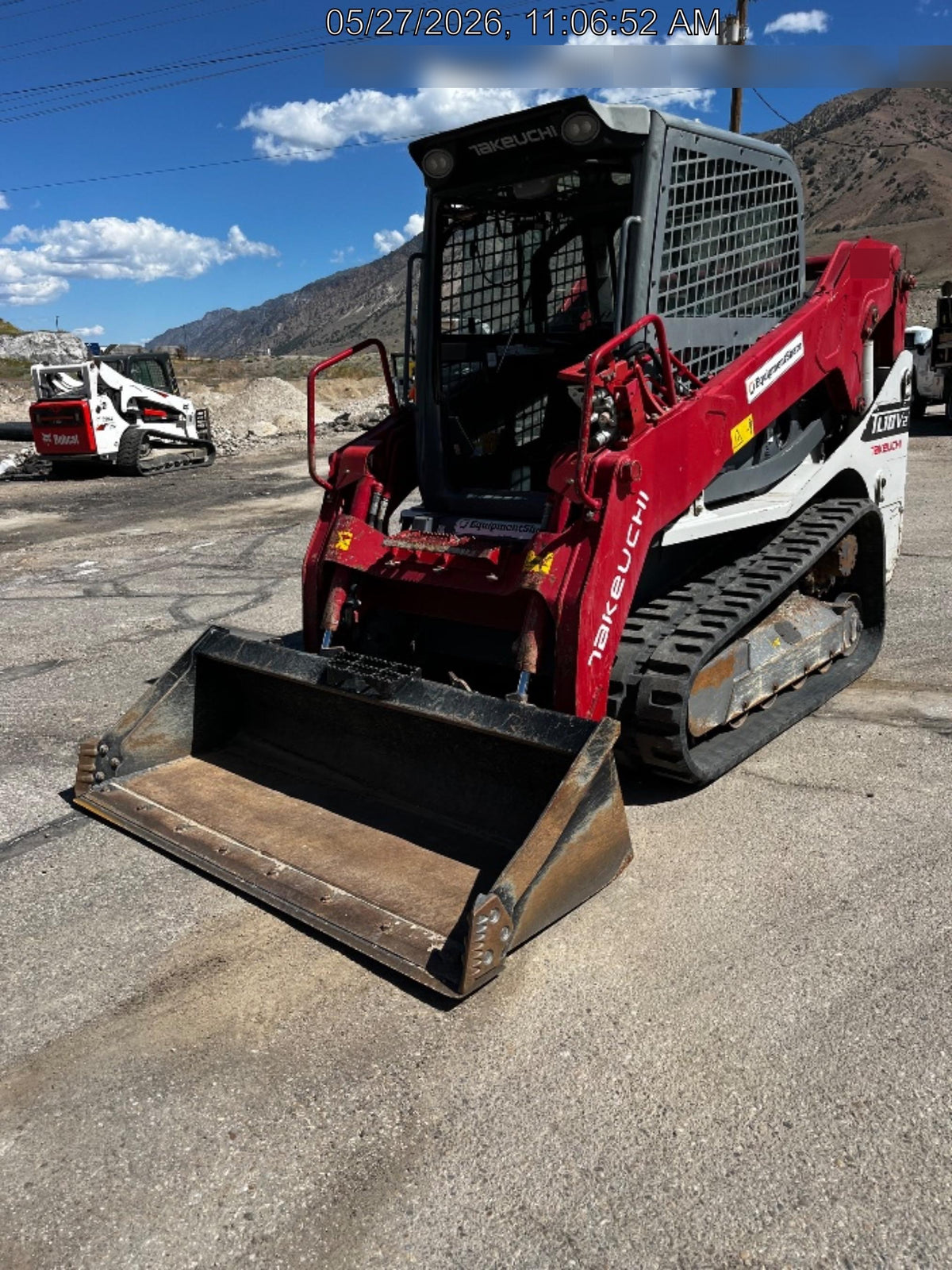 2019 Takeuchi TL10V2-CR Cab/Heat/AC, Rubber Tracks, Backup Alarm, Front & rear working Lights, Auxiliary Hydraulics, 2 Speed Travel, Engine Monitoring System, Hydraulic universal quick hitch w/76" HD dirt bucket with 8 teeth, 20.3 cubic feet capacity, 48" Pallet forks and frame