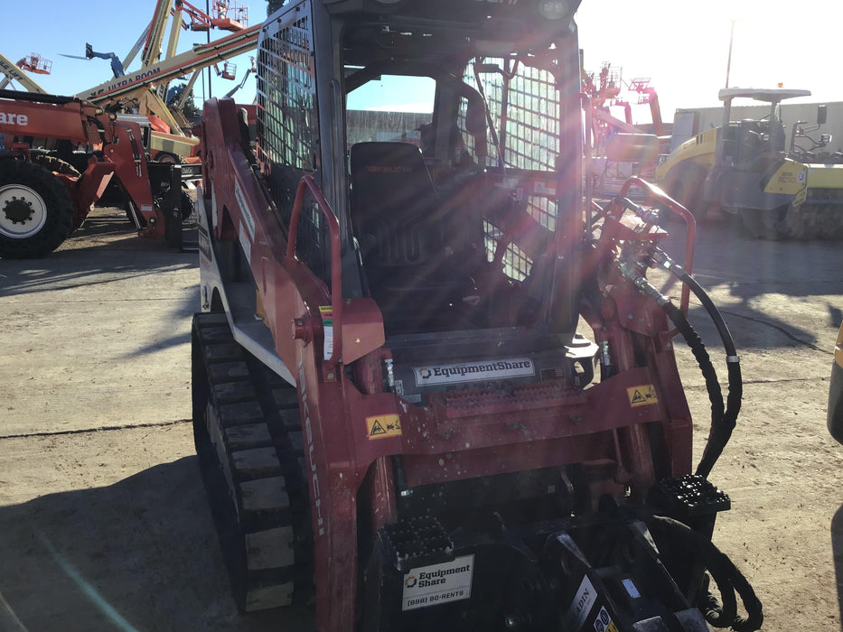 2019 Takeuchi TL10V2-CR Cab/Heat/AC, Rubber Tracks, Backup Alarm, Front & rear working Lights, Auxiliary Hydraulics, 2 Speed Travel, Engine Monitoring System, Hydraulic universal quick hitch w/76" HD dirt bucket with 8 teeth, 20.3 cubic feet capacity, 48" Pallet forks and frame