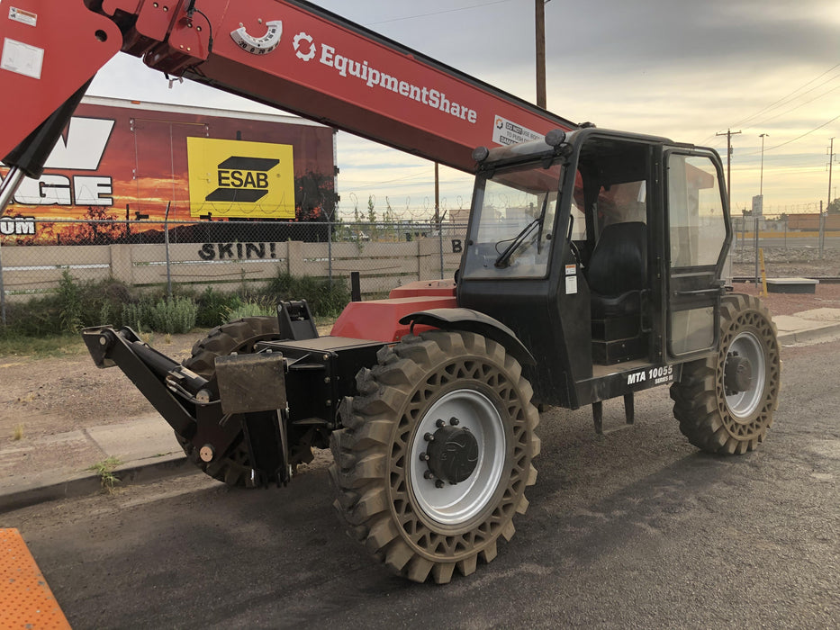 2020 Manitou MTA10055 Cab/Heat/Air, LED Work Lights, Solid Tires, Lift Hook, Beacon, Auxiliary Hydraulics w/66" Carriage and 60" Forks