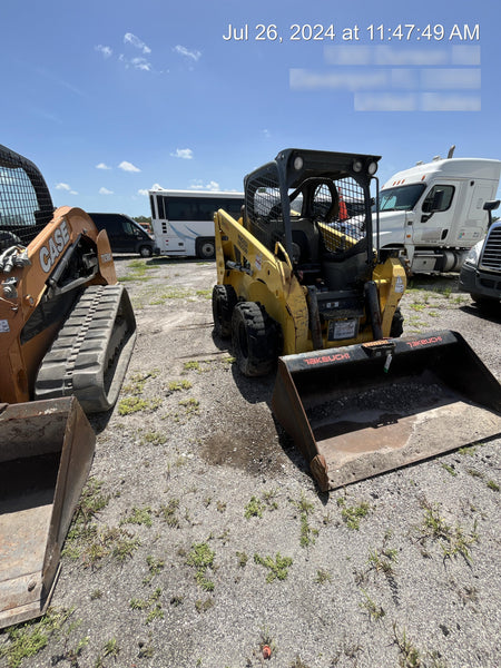 Wacker Neuson SW24 SW24 8k Wheeled Skid Loader, open ROPS, 75" Bucket LP w/ smooth bolt on edge, 72” Angle broom w/universal controller 8 pin