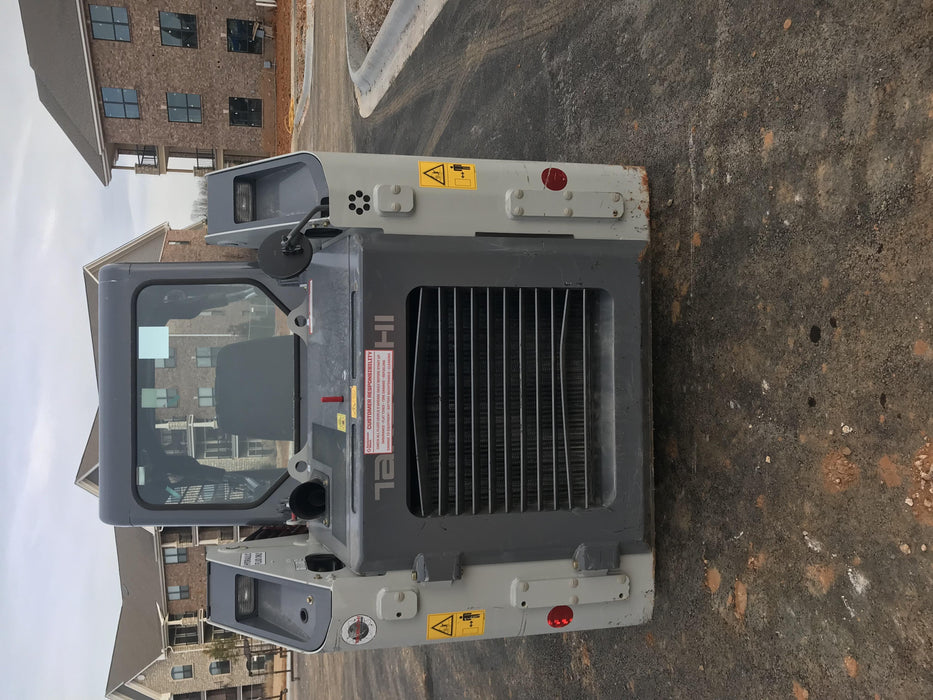 2019 Takeuchi TL8 Radial ROPS, ROPS/FOPS Canopy, 15" Wide Rubber Tracks, Back-up Alarm, Front & Rear Working Lights, Auxiliary Hydraulics, Two-Speed Travel, Electronic Monitoring System 76" HD Dirt Bucket with 8 Teeth, 20.3 cubic feet Capacity