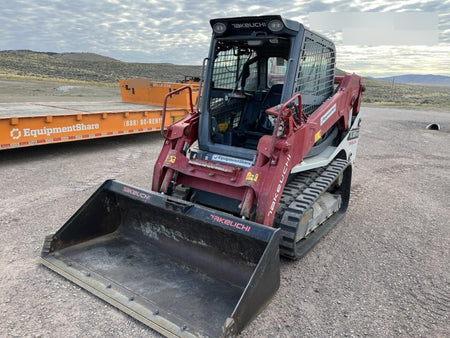 2019 Takeuchi TL10V2-CR Cab/Heat/AC, Rubber Tracks, Backup Alarm, Front & rear working Lights, Auxiliary Hydraulics, 2 Speed Travel, Engine Monitoring System, Hydraulic universal quick hitch w/76" HD dirt bucket with 8 teeth, 20.3 cubic feet capacity, 48" Pallet forks and frame