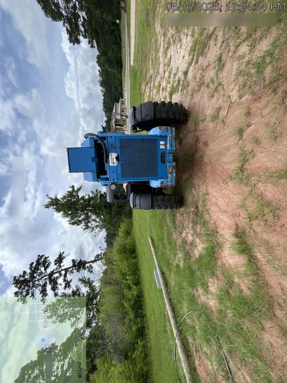 2018 Genie GTH-1056 Genie GTH-1056 w/Open ROPS, Solid Tires, Work Light/Beacon, 60" Carriage and Forks