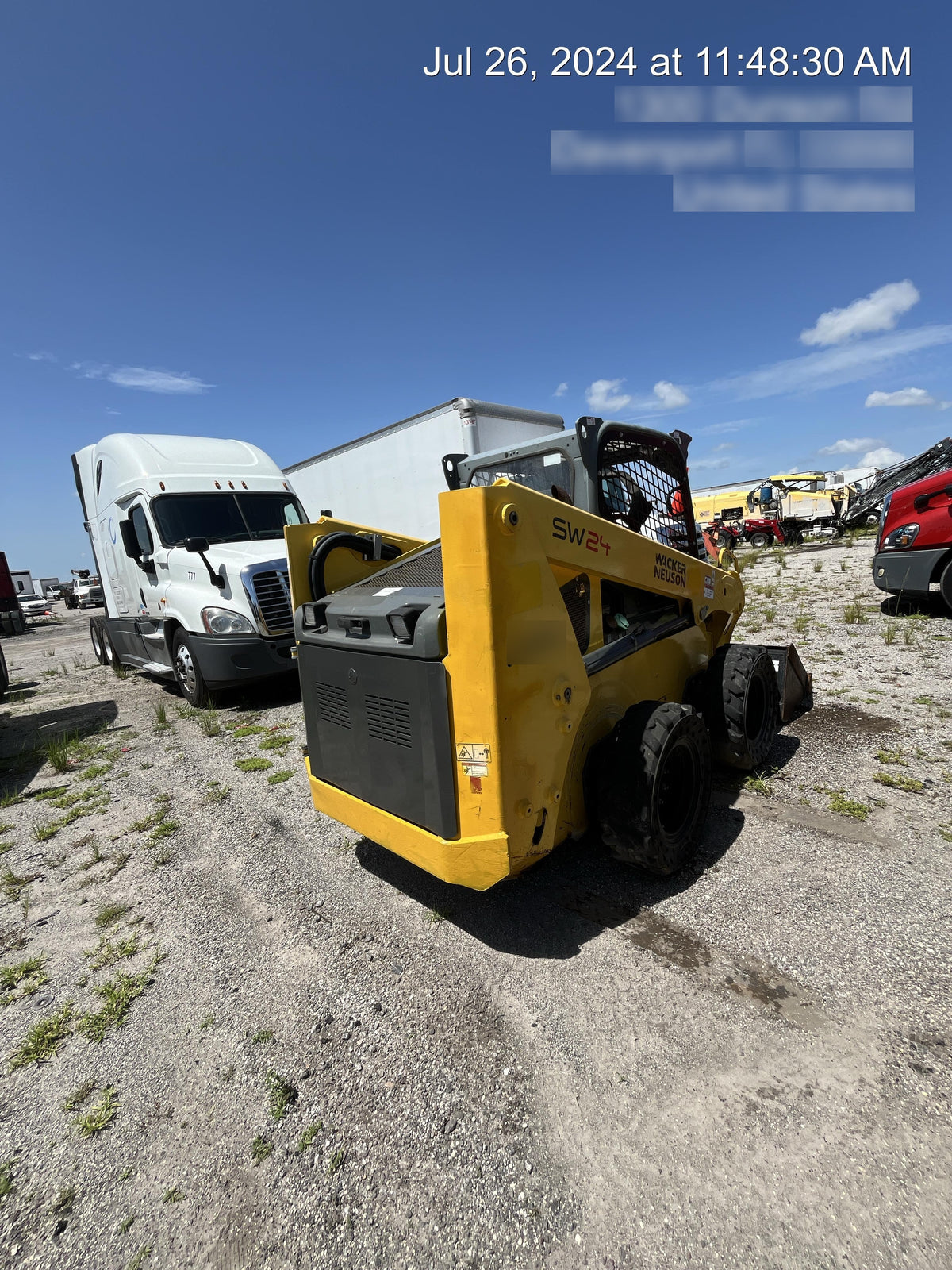 Wacker Neuson SW24 SW24 8k Wheeled Skid Loader, open ROPS, 75" Bucket LP w/ smooth bolt on edge, 72” Angle broom w/universal controller 8 pin