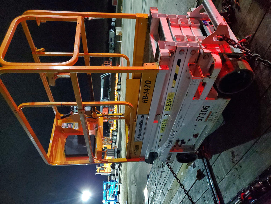 Custom Equipment HB-1430 <ul>
 <li>Hy-Brid Scissor Lift</li>
  <li>Platform capacity up to 670 lbs.</li>
  <li>Working height up to 20 ft</li>
  <li>Weighs under 1,700 lbs.</li>
  <li>Non-marking wheels </li>
</ul>