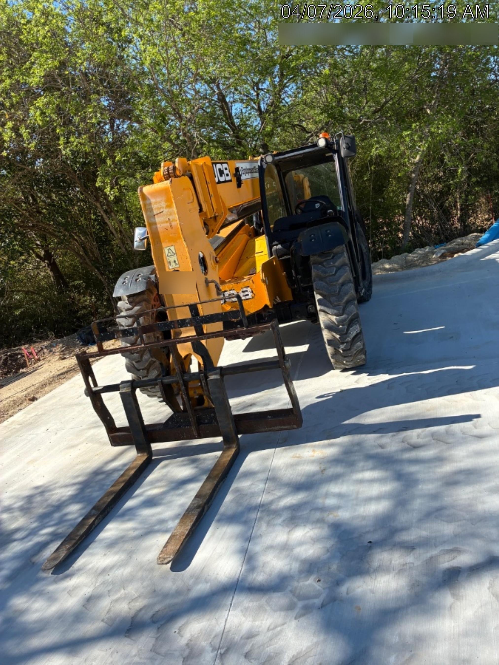 2019 JCB 509-42 74 HP w/Open ROPS, Beacon, Aux Hydraulics, LED Work lights, Solid Tires w/66" Carriage/60" Forks