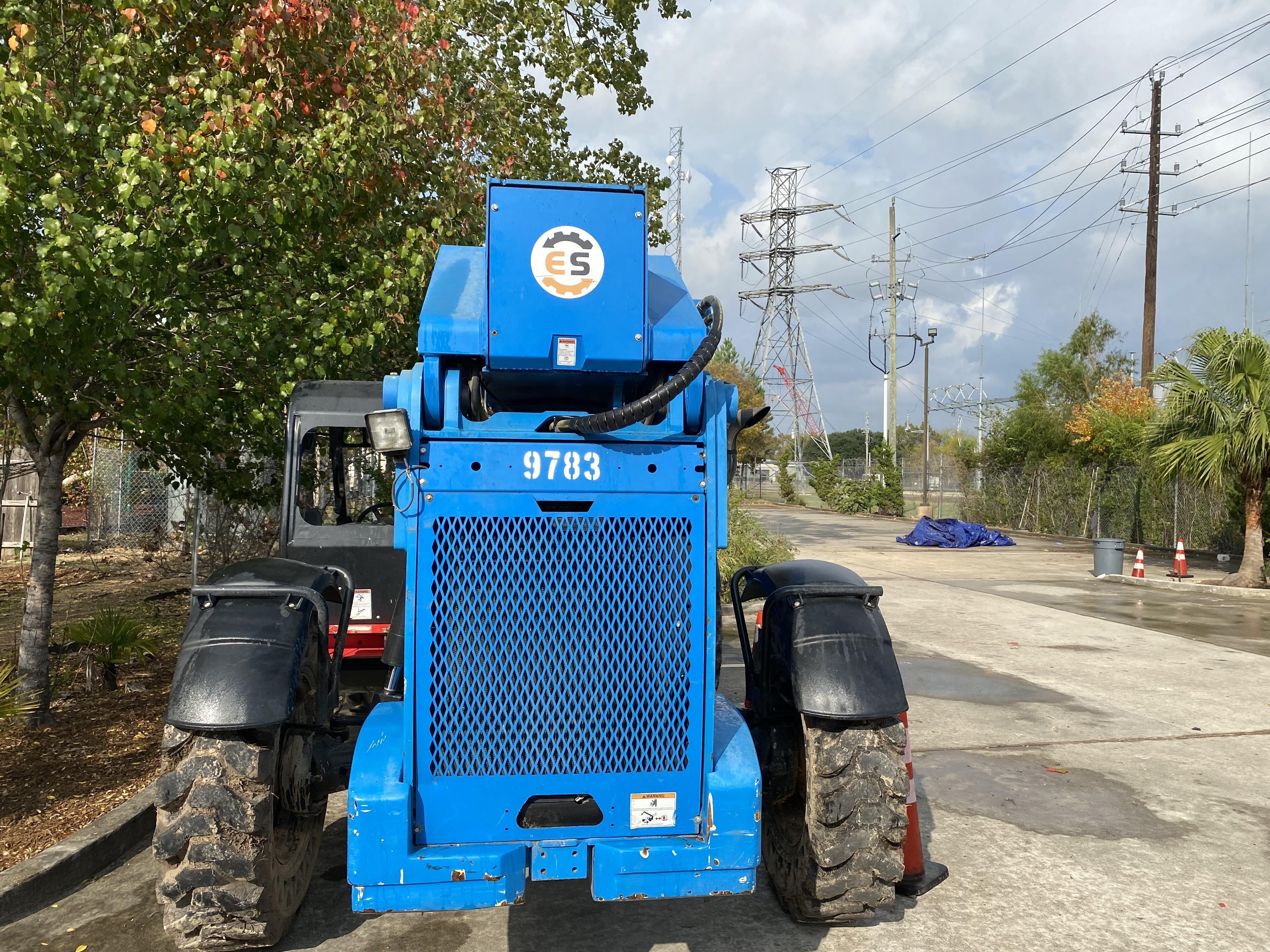 2018 Genie GTH-1056 Genie GTH-1056 w/Open ROPS, Solid Tires, Work Light/Beacon, 60" Carriage and Forks