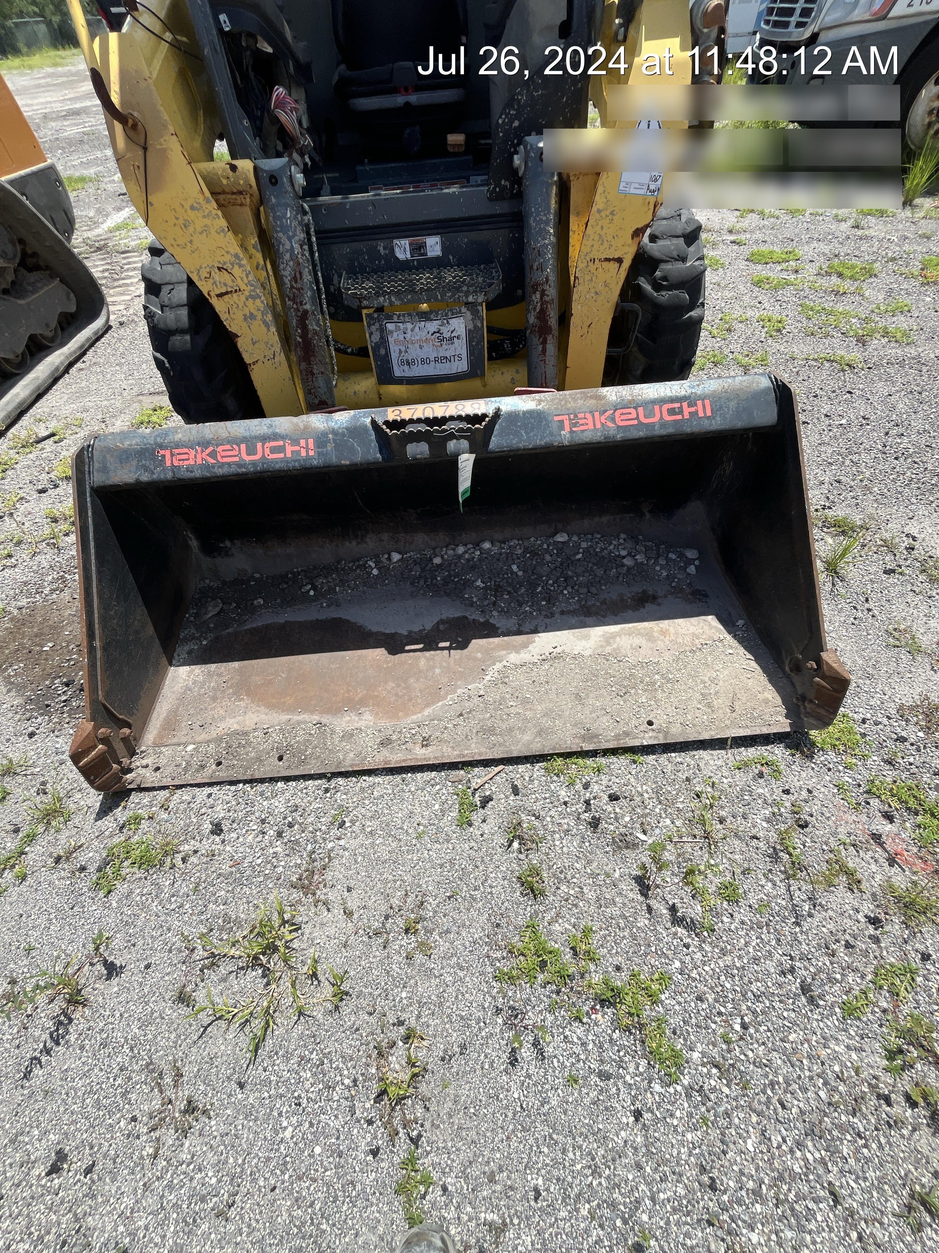 Wacker Neuson SW24 SW24 8k Wheeled Skid Loader, open ROPS, 75" Bucket LP w/ smooth bolt on edge, 72” Angle broom w/universal controller 8 pin