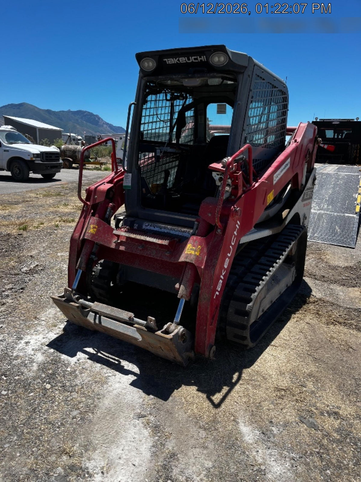 2019 Takeuchi TL10V2-CR Cab/Heat/AC, Rubber Tracks, Backup Alarm, Front & rear working Lights, Auxiliary Hydraulics, 2 Speed Travel, Engine Monitoring System, Hydraulic universal quick hitch w/76" HD dirt bucket with 8 teeth, 20.3 cubic feet capacity, 48" Pallet forks and frame