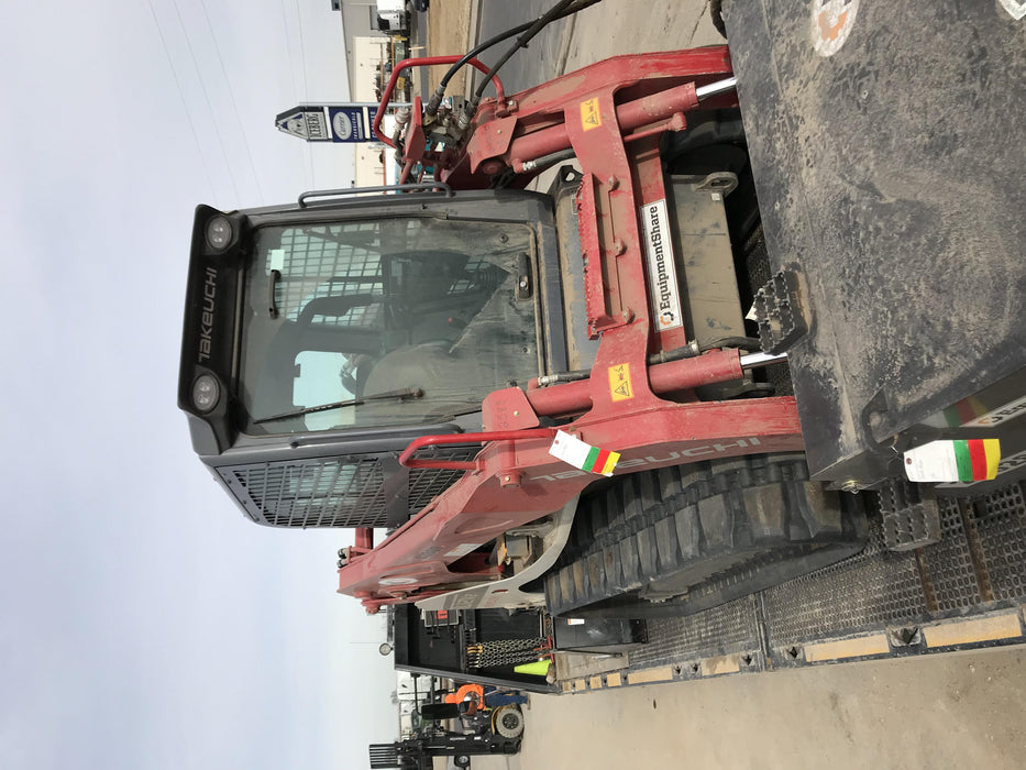 2019 Takeuchi TL12V2C ROPS/FOPS Cab, Heat/AC, Defroster, Rubber Tracks, Back-up Alarm, Front & Rear Working Lights, Auxiliary Hydraulics, Two-Speed Travel, Electronic Monitoring System, Hydraulic Universal Quick Hitch w/80" HD Dirt Bucket with 9 Teeth 24.0 cu.ft. Capacity