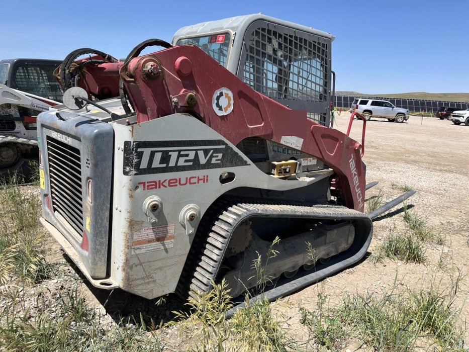 2019 Takeuchi TL12V2C ROPS/FOPS Cab, Heat/AC, Defroster, Rubber Tracks, Back-up Alarm, Front & Rear Working Lights, Auxiliary Hydraulics, Two-Speed Travel, Electronic Monitoring System, Hydraulic Universal Quick Hitch w/80" HD Dirt Bucket with 9 Teeth 24.0 cu.ft. Capacity
