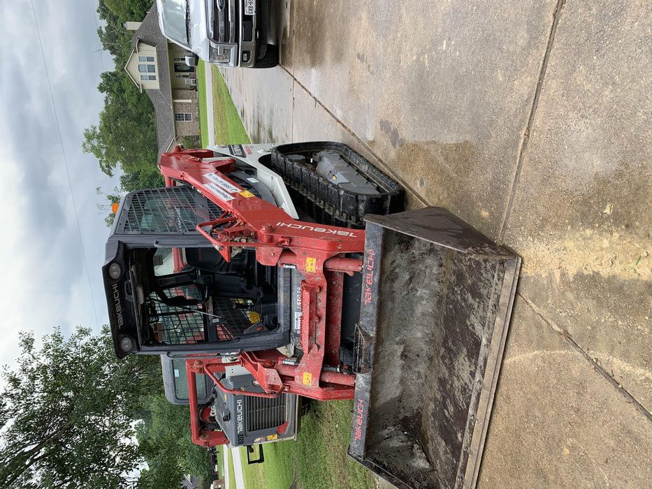 2019 Takeuchi TL10V2-CR Cab/Heat/AC, Rubber Tracks, Backup Alarm, Front & rear working Lights, Auxiliary Hydraulics, 2 Speed Travel, Engine Monitoring System, Hydraulic universal quick hitch w/76" HD smooth dirt bucket with bolt-on edge, 20.3 cubic feet capacity, 48" Pallet forks and frame