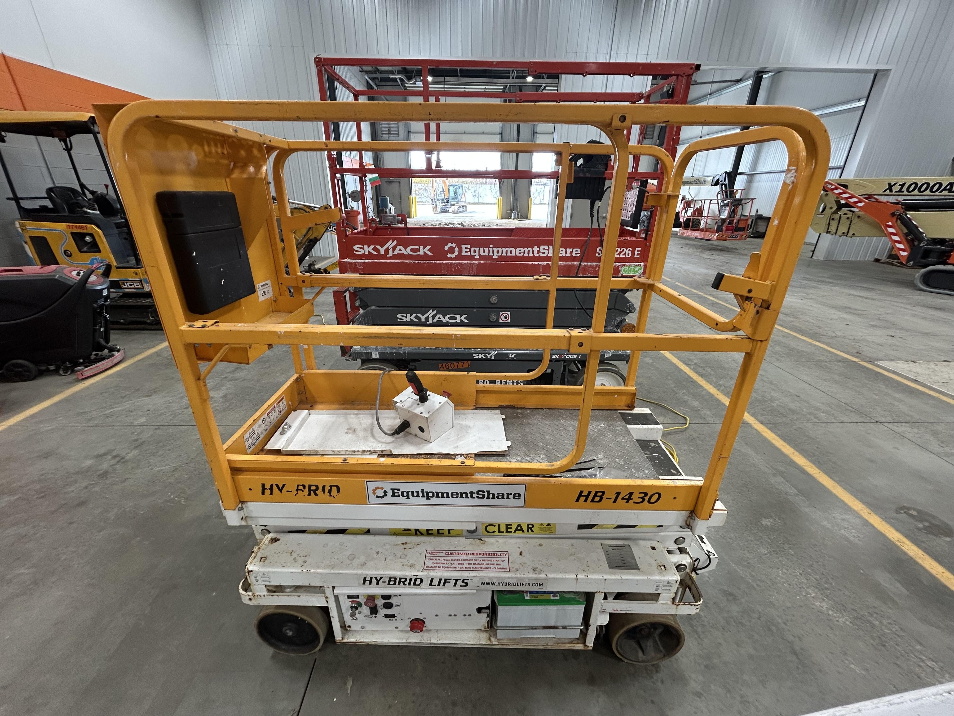 Custom Equipment HB-1430 <ul>
 <li>Hy-Brid Scissor Lift</li>
  <li>Platform capacity up to 670 lbs.</li>
  <li>Working height up to 20 ft</li>
  <li>Weighs under 1,700 lbs.</li>
  <li>Non-marking wheels </li>
</ul>