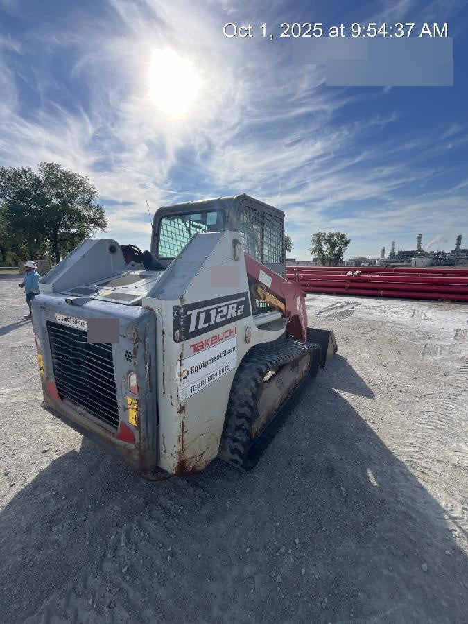 2019 Takeuchi TL12R-2 Cab/Heat/Air w/Auxiliary Hydraulics, 2 Speed, Hydraulic QC 80" Smooth Bucket, 48" Pallet Forks