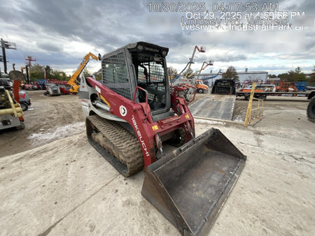 2019 Takeuchi TL12R-2 Cab/Heat/Air w/Auxiliary Hydraulics, 2 Speed, Hydraulic QC 80" Smooth Bucket, 48" Pallet Forks