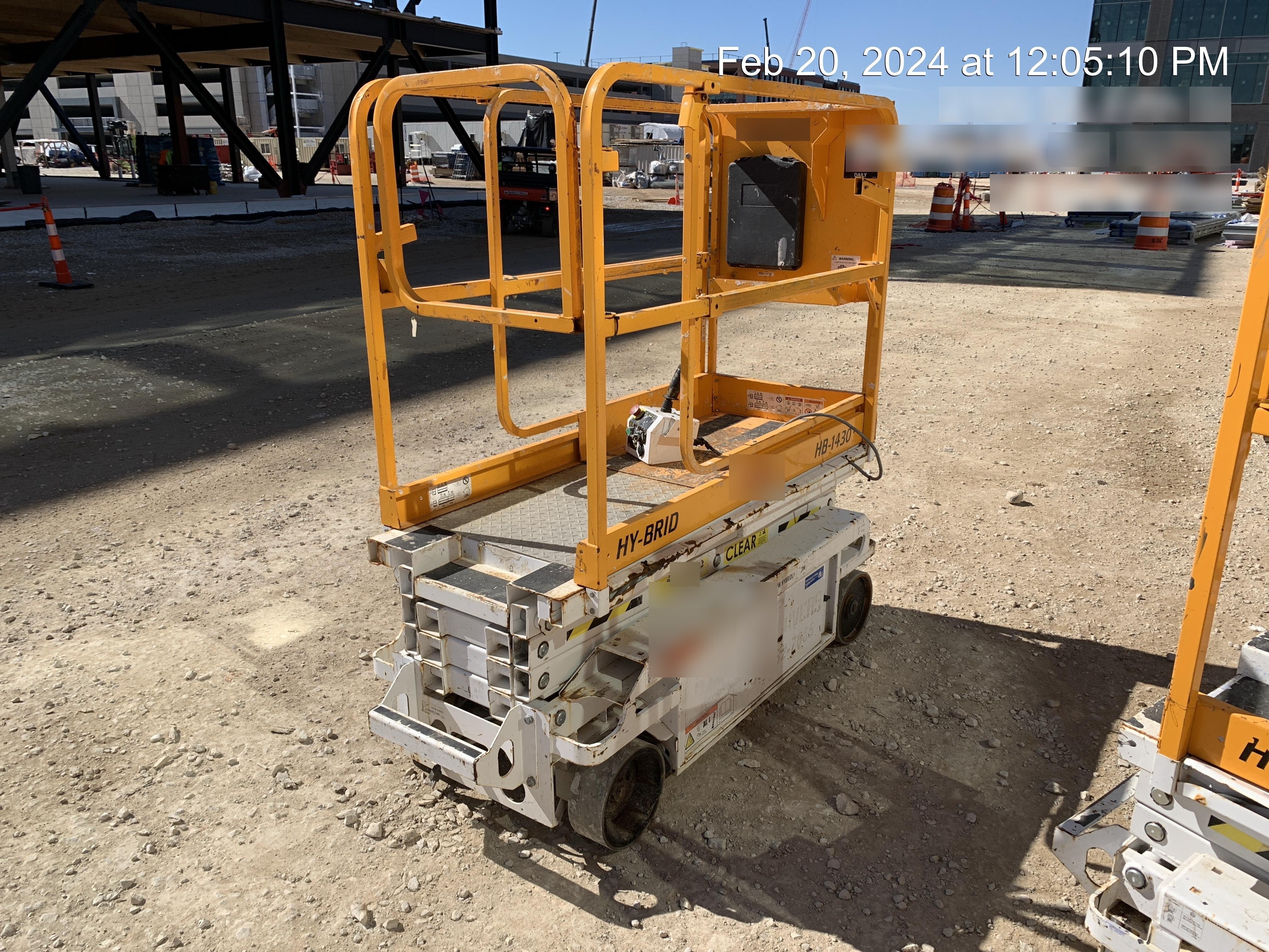 Custom Equipment HB-1430 <ul>
 <li>Hy-Brid Scissor Lift</li>
  <li>Platform capacity up to 670 lbs.</li>
  <li>Working height up to 20 ft</li>
  <li>Weighs under 1,700 lbs.</li>
  <li>Non-marking wheels </li>
</ul>