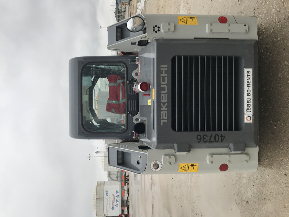2019 Takeuchi TL8 Cab, Heat/AC, Defroster, 15" Wide Rubber Tracks, Back-up Alarm, Front & Rear Working Lights, Auxiliary Hydraulics, Two-Speed Travel, Electronic Monitoring System, Hydraulic Universal Quick Hitch 76" HD Smooth Dirt Bucket with Bolt-On Edge, 20.3 cubic feet Capacity