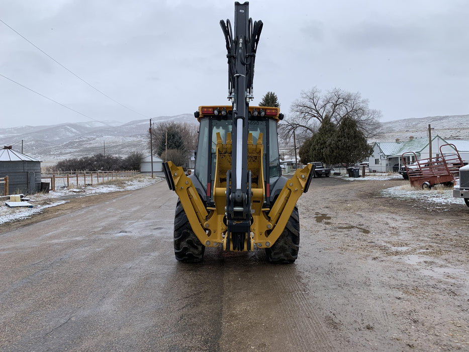 2019 John Deere 410L 4WD, CAB/HVAC, Standard Dipperstick, ISO Controls, Rear Aux Hydraulics, Manual QC w/1.5 Yd Bucket w/Forks, 24" Bucket