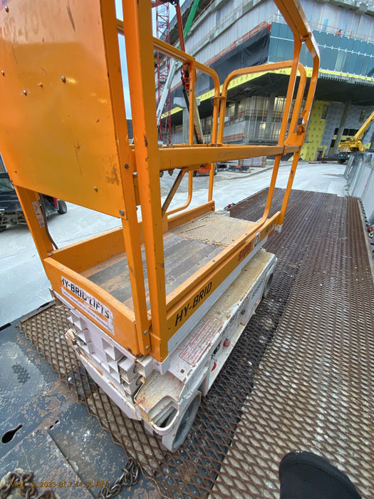 Custom Equipment HB-1430 <ul>
 <li>Hy-Brid Scissor Lift</li>
  <li>Platform capacity up to 670 lbs.</li>
  <li>Working height up to 20 ft</li>
  <li>Weighs under 1,700 lbs.</li>
  <li>Non-marking wheels </li>
</ul>