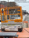 Custom Equipment HB-1430 <ul>
 <li>Hy-Brid Scissor Lift</li>
  <li>Platform capacity up to 670 lbs.</li>
  <li>Working height up to 20 ft</li>
  <li>Weighs under 1,700 lbs.</li>
  <li>Non-marking wheels </li>
</ul>