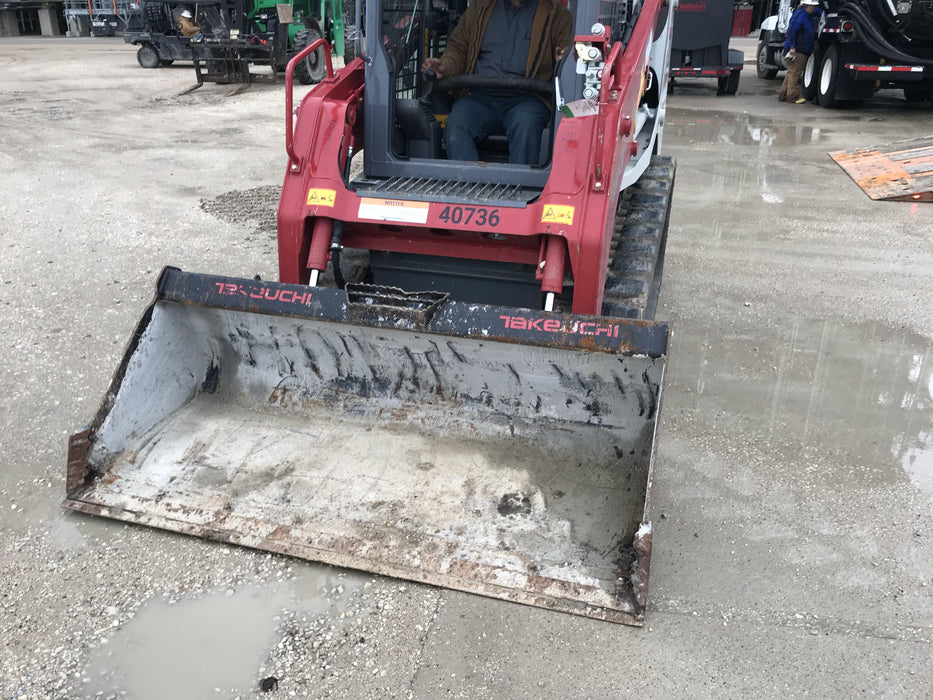 2019 Takeuchi TL8 Cab, Heat/AC, Defroster, 15" Wide Rubber Tracks, Back-up Alarm, Front & Rear Working Lights, Auxiliary Hydraulics, Two-Speed Travel, Electronic Monitoring System, Hydraulic Universal Quick Hitch 76" HD Smooth Dirt Bucket with Bolt-On Edge, 20.3 cubic feet Capacity