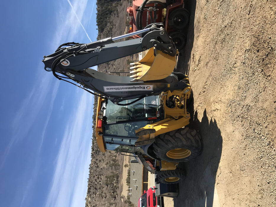 2019 John Deere 410L 4WD, CAB/HVAC, Standard Dipperstick, ISO Controls, Rear Aux Hydraulics, Manual QC w/1.5 Yd Bucket w/Forks, 24" Bucket